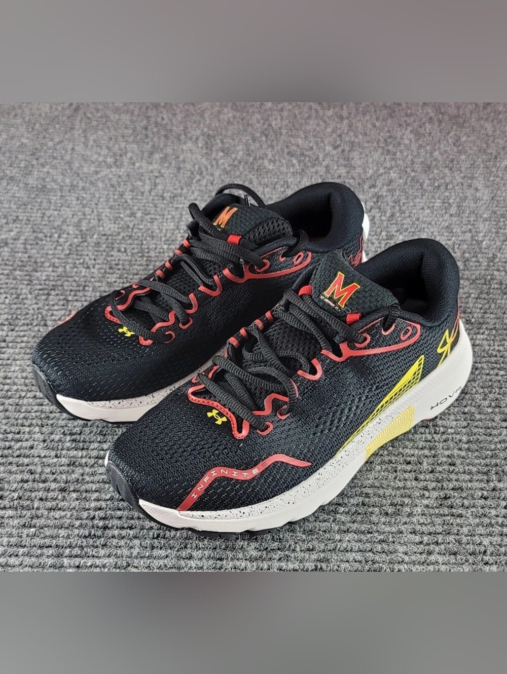 Under Armour Black Running Shoes with Red and Yellow Accents